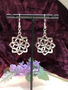 Whether for special occasions or for everyday wear, these beautiful Celtic knot star earrings are an absolute highlight. The earrings have a smooth and polished surface and literally sparkle in the sunlight. Whether as a gift or for yourself, these very beautiful handmade and nickel-free earrings are a unique accessory. The hooks of the earrings are made of 925 silver and are therefore also suitable for allergy sufferers. The pendants are approx. 2.5 cm x 2.5 cm. The total length is approx. 4.5 cm. The size and mass of the pendants gives the earrings a slightly increased weight; nevertheless suitable for daily wear. The earrings are lovingly packaged and are therefore ready to give as a gift. ❤️ Handmade with love ❤️ Celtic Knot Earrings, Star Silver, Earrings Star, Nickel Free Earrings, Knot Earrings, Free Earrings, Celtic Jewelry, Gift Handmade, Celtic Knot