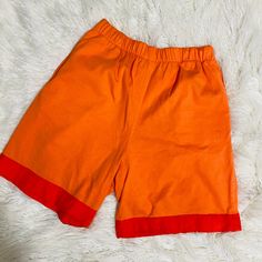 "These are awesome vintage Johnny Was shorts! They are a soft knit with an elastic Waist. Perfect for lounging or a casual look! There are some small stains on the hem of the right leg and near the bottom of the left leg. They have pockets! The trim on the bottom is like a silky rayon. They sit high on the waist. These are a tag size large. See measurements below.  Waist unstretched 28\" Inseam 7.5\"" Embroidered Denim Jacket, Cute Swimsuits, Black Vest, Lounge Shorts, Embroidered Denim, T Shirt And Shorts, Johnny Was, Soft Knits, Short Outfits