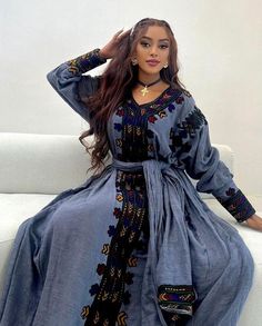 Discover the charm of the Habesha dress, also known as Habesha kemis, a beautiful Ethiopian traditional dress in a darker blue shade. This attire captures the rich cultural heritage of Ethiopia, perfect for special occasions and celebrations with its deep, elegant color and timeless design. Material Cotton Thread Estimated delivery : 1 weeks to 2 weeks Contact WhatsApp +1(304)-306-2784Email: contact@ethiopian.store Blue Dresses For Navratri Traditional Ceremonies, Blue Bohemian Dress With Traditional Patterns, Blue Dresses With Traditional Patterns For Ceremonial Wear, Blue Dabka Dress For Traditional Ceremonies, Traditional Blue Floor-length Dress, Transitional Blue Dresses With Dabka Details, Traditional Blue Kaftan For Navratri, Blue Embroidered Dress For Navratri, Blue Bohemian Dress With Traditional Drape