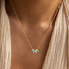 T U R Q U O I S E ∙ O P A L ∙ N E C K L A C E  Searching for a fresh, new look for the season? Our Turquoise Opal Marquise Necklace is the unique jewelry piece you are looking for! The floral design and enchanting turquoise gemstones make this pendant necklace a no brainer when it comes to a style refresh. * Material: High Quality Solid 925 Sterling Silver * Finish: 18K Gold ∙ Sterling Silver * Featuring ~15x8mm Marquise CZ Turquoise Opal Flower Pendant on a dainty Cable Chain, adjustable from 1 Marquise Necklace, Rectangle Necklace, Necklace Opal, Small Necklace, Flower Pendant Necklace, Jewelry Lookbook, Birthday Jewelry Gift, Birthday Gift For Her, Green Gemstones