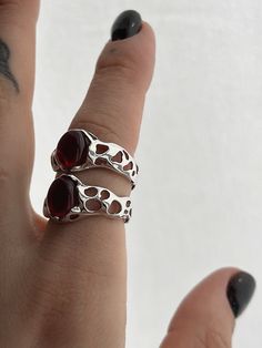 This massive vintage ring is suitable for the brightest and boldest. Easily add brightness to your style. It is suitable both for every day and for any holiday - you definitely will not go unnoticed🥂 This ring can be mixed with other jewelry depending on the mood. This versatile, but at the same time unique jewelry is suitable both for a gift and to please yourself - you definitely will not go wrong with the size and choice, as this ring can be easily adjusted to the size you need. *It is made of 925 sterling silver, is hypoallergenic, will not change color and will not leave green marks on the fingers. Weight of product: 5 g ► DELIVERY * Orders are processed and deposited at the post office within 48 hours maximum after validation of the payment by the ETSY platform (Excluding weekends!) Unique Silver Garnet Rings, Silver Ruby Crystal Open Ring, Silver Ruby Open Crystal Ring, Silver Ruby Open Ring, Silver Crystal Ring With Ruby Birthstone, Silver Open Ruby Ring, Silver Garnet Ring Stamped 925, Garnet Open Ring Promise Ring, Sterling Silver Open Ring With Ruby Stone Setting