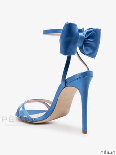 Formal Light Blue Open Toe Sandals, Blue High Heel Sandals With Heel Strap, Blue Sandals With Heel Strap For Party, Light Blue Ankle Strap Sandals For Evening, Elegant Blue Pointed Toe Sandals, Blue Party Sandals With 4-inch Heel, Blue Sandals With 4-inch Heel For Party, Blue Fitted Sandals With Ankle Strap, Blue Sandals With Heel And Single Toe Strap