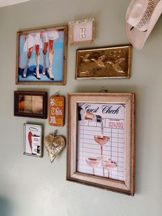 a wall with pictures and other items on it