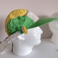 Materials: 100% Nylon. Mint Condition, Never Worn W/Tags, And Stored In A Smoke Free Environment. From My Private Collection Price Firm Thanks For Browsing! Green Baseball Cap For Spring Outdoor Activities, Green Baseball Cap For Outdoor Spring Activities, Yellow Visor Baseball Cap For Summer, Yellow Summer Visor Baseball Cap, Yellow Cotton Outdoor Hat, Yellow Baseball Cap For Summer Outdoor, Yellow Cotton Hat For Outdoor, Yellow Summer Baseball Cap For Outdoor, Yellow Baseball Cap For Spring