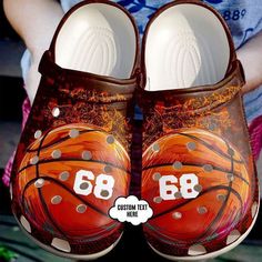 a pair of shoes with the number 86 painted on them