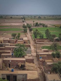 an aerial view of a village in the desert