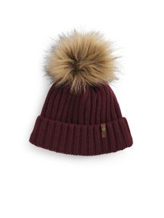 When the temperature drops, add our cosy Bobble Hat to your winter wardrobe to keep the cold out. It’s back by popular demand in a choice of sophisticated seasonal shades. Crafted from our premium Merino wool blend with a soft fleece band inside, look forward to warmth, quality and softness in one. Finished with a luxuriously fluffy faux-fur bobble and a leather tab with a signature shiny light gold shield hardware to ensure your look is weekend-ready yet unmistakably Fairfax & Favor. Finish the Gold Shield, Business Travel Bag, Fairfax And Favor, Wooly Hats, Tassel Purse, Bobble Hat, Deck Shoes, Bobble Hats, Chelsea Ankle Boots