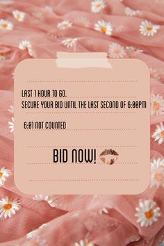 a pink dress with daisies on it and the words bid now written in black