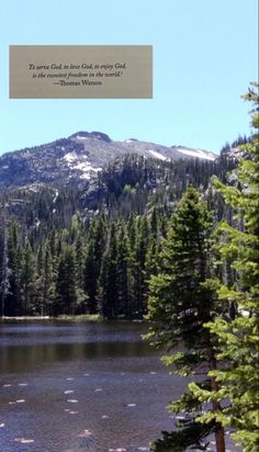 a lake surrounded by trees and mountains with a quote above it that reads, the water is