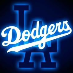 the los angeles dodgers logo is illuminated in blue