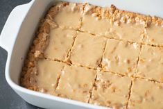 a casserole dish filled with peanut butter and oatmeal