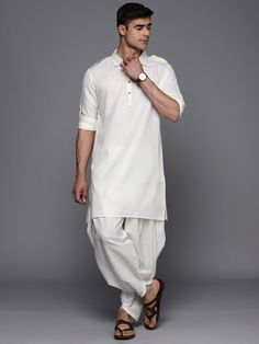 A timeless classic, this White Solid Linen Blend Pathani Kurta with Pyjamas is a sophisticated and practical addition to any wardrobe. Featuring a solid pattern, Pathani shape, and regular style, the shirt collar and long roll-up sleeves ensure comfort, while the calf-length with straight hem gives it a timeless look. The certified machine weave linen ensures a lightweight, breathable, and durable fabric, and the solid Pyjamas come with a partially elasticated waistband and slip-on closure for a