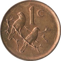 an old coin with two birds on it