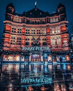 the harry potter building lit up at night