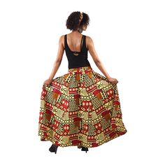 The Ankara Print Elastic Maxi Skirt is a long, flowing skirt that combines traditional African design with modern style. It's fitted with an elastic waist and includes straps for a bow tie, offering both comfort and a customized fit. The A-line cut with pleats and practical pockets add both elegance and utility, making it suitable for all your favorite occasions. This skirt comes with a matching head wrap, creating a complete look that is both vibrant and versatile. Features: Elastic waist with Ankara Print, A Line Cut, Natural Body Care, Body Oils, Printed Maxi Skirts, Flowing Skirt, African Design, Head Wrap, Printed Maxi