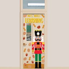 a door with an image of a nutcracker and the words nuts about learning on it