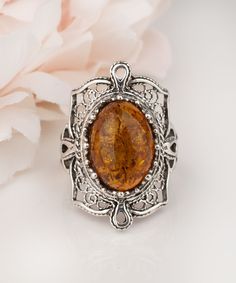 Natural Authentic Amber Silver Ring 925 Sterling Silver Handmade Artisan Crafted Ornate Filigree Ring Material: 925 Sterling Silver Genuine Natural Amber Gemstone Dimensions : 14 mm x 10 mm Ring Face Length: 1 inches Width: 0.60 inches Comes with a gift pouch and box Free Domestic Shipping Excellent quality, have sold in the USA, Canada, Italy, Germany and the UK, and received hundreds five star reviews. It is a gift that will create memories for years to come. Our fine silver jewelry is Made in Etched Jewelry Gift, Bohemian Filigree Ring, Spiritual Filigree Ring With Intricate Design For Gift, Bohemian Filigree Ring As Gift, Vintage Silver Filigree Ring For Gift, Vintage Silver Filigree Ring As Gift, Vintage Amber Jewelry With Engraved Details, Vintage Amber Engraved Jewelry, Bohemian Filigree Ring As A Gift