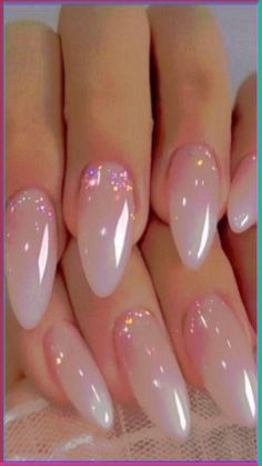 7 Easy Step-by-Step Beginner Nail Art Tutorials | Social media is full of beautiful nail art designs, from flowers and daisies, to clouds and hearts, to flames and spiders, to gorgeous ombre, marble, and water-colour looks. If you want to give yourself a DIY manicure with a little fare, this post has lots of simple videos that are easy to follow. We've also include nail art essentials to help elevate your nail art skills in a pinch! These are especially helpful for DIY French manicures! Glitter Nail Bed, Natural Sparkly Acrylic Nails, Simple Chic Nails Classy Almond, French Fade Nails Almond Glitter, Ombre Tip Nails Almond, Almond Color Tip Nails, Opal Chrome French Tip Nails, Beautiful Classy Nails, Special Occasion Nails Almond