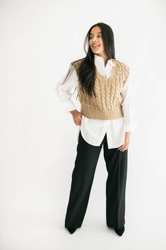 Sweater vests are all the rage and we have the perfect one for you! Our Caroline sweater vest features a v-neckline and cable knit detail in a dreamy mocha color. It is cozy and chic all in one. model is wearing a small. Height 5'6", Bust 34", Waist 27", Hip 37" Size Chart Size & Fit Size S - length measures 19" from shoulder to hem. Bust 34" Size M- length measures 20" from shoulder to hem. Bust 36" Size L - length measures 21" from shoulder to hem. Bust 38"