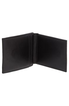 Keep your cards and cash stylishly secure in this sleek leather wallet that features a magnetic front pocket. Interior features card slots Leather Imported Modern Wallet With Id Window For Business, Modern Business Wallet With Id Window, Formal Rectangular Trifold Wallet With Magnetic Closure, Business Leather Wallet With Magnetic Closure, Leather Business Wallet With Magnetic Closure, Business Leather Wallets With Magnetic Closure, Leather Wallets With Magnetic Closure For Business, Classic Bifold Wallet With Magnetic Closure, Classic Black Wallet With Magnetic Closure