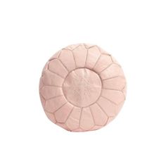 a pink leather poufle on a white background