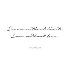 the words dream without limits love without fear are written in black ink on a white background