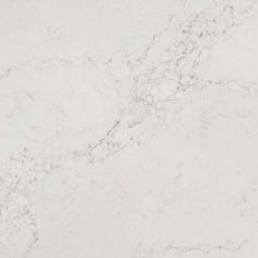 a white marble counter top that is very clean