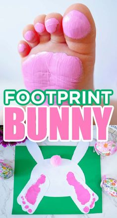 the foot print bunny craft is shown on top of a green sheet with pink paint