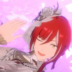 an anime character with red hair wearing a white dress and holding her hand up in the air