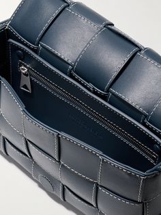 Bottega Veneta's messenger bag has been crafted in Italy using the brand's signature intrecciato weave. It's made from 'Deep Blue' leather and features contrasting topstitching throughout. Store your phone in the zipped pocket inside. Bottega Veneta Intrecciato Bag, Porter Bag, Messenger Bag For Men, Leather Messenger Bag Men, Bottega Veneta Cassette, Latest Bags, Messenger Bag Men, Leather Messenger Bag, Leather Messenger