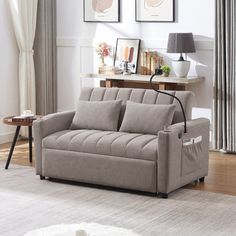 a living room scene with focus on the couch and coffee table in the foreground