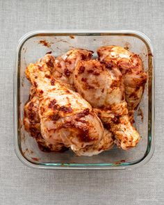 cooked chicken in a glass dish on a table