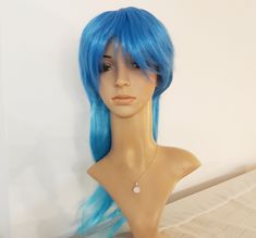 Azure blue and turquoise long wavy hair. Anime cosplay wig. Free shipping in US. Color: Azure blue (turquoise at rear lower part), Ombre Style: Long wavy hair, two layers Material: High heat resistant synthetic hair Length: About 53 cm / 21 inches This wig will come with breathable cap and elasticated straps for a comfort and easy fit. Please note that the colors on photo can differ because of light, screen settings, personal color perception, etc. Please read the description, check actual photo Blue Turquoise Wigs, Long Wavy Hair Anime, Wavy Hair Anime, Blue Cosplay Wig, Blue Cosplay, Color Perception, Long Wavy Wig, Halloween Party Costume, Hair Anime