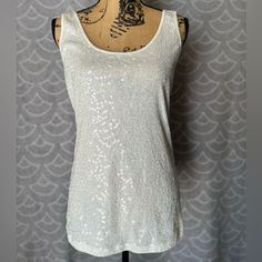 Simple Classic Tank, Great For Going Out, Or Casual Dining, Great With A Pair Of High Waisted Jeans Or A Simple Skirt * 60% Cotton * 40% Polyester Elegant Stretch Sequin Tank Top, Elegant Sequined Stretch Tank Top, White Sequin Tops For Party Season, White Stretch Top With Sequins, White Stretch Tops With Sequins, White Stretch Sequined Tops, Fitted White Sequined Tank Top, White Sequined Stretch Tops, White Fitted Sequin Fabric For Summer