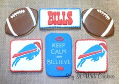 decorated cookies are arranged in the shape of footballs and bills on top of each other