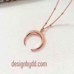 "Rose Gold Double Horn Pendant Necklace with Satellite Chain Perfect Bohemian Layering Necklace Beaded Crescent Moon Chain Necklace Great statement necklace. Great for layering. I love you to the moon in back. Perfect gift for your best friend. This necklace is very on trend, and great for everyday wear. Will not tarnish ♥ Crescent Moon Charm 24 mm x 19 mm Vermeil -18kt Rose Gold Plated over sterling silver and 925 Sterling Silver ♥ Necklace Length - 12-26\" ♥ Chain - 14kt Rose Gold Satellite Ch Rose Gold Moon Phase Round Pendant Necklace, Rose Gold Moon Phase Necklace, Rose Gold Necklace With Round Moon Charm Pendant, Rose Gold Moon Charm Pendant Jewelry, Rose Gold Crescent Necklace With Moon Charm, Rose Gold Crescent Moon Charm Necklace, Dainty Rose Gold Jewelry With Moon Charm, Rose Gold Moon Necklace With Moon Charm, Rose Gold Moon Charm Necklace