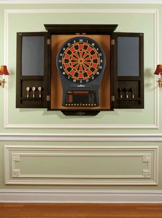 a dart board mounted to the side of a wall