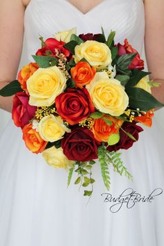 a bride holding a bouquet of flowers in her hands