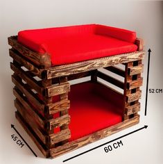 a bench made out of wooden pallets with red cushion on the top and bottom