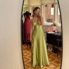 "Green Satin Woman Long Dress, Slit Party Dress, Maxi Dress for Prom, Evening events, and for bridesmaids. Also available as Custom Made. How to find the perfect, most flattering dress, that will be both comfortable and affordable but equally important and will make you stand out & and wow the crowd? This satin maxi dress has Low V Neckline, spaghetti straps, full flared bottom, and high front side slit.  Feminine and sensual maxi dress, figure flattering to all. Perfect & and classic dress for proms, parties, New Year's parties, premiers, evening occasions, and for a bridesmaid. Product Details: ♥ Front  ♥ Open back ♥ Sleeveless with spaghetti straps. ♥ Floor-length dress ♥ Length waist to hemline - 45.2'' / 115 cm ♥ Elastic at the waist ♥ stretch fabric ♥ Color - Green Sizes: S, M, L ת M Maxi Dress Satin Green, Open Back Green Dress, Bright Green Formal Dress, Wedding Guest Dress Open Back, Green Silk Dress Prom, V-neck Satin Prom Dress, Light Green Prom Dress Long, Satin Dresses Green, Maxi Dress Outfit Wedding