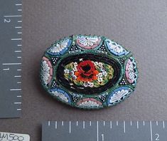 Antique Mosaic brooch Italian The jewelry in this Etsy shop is from the collection and store inventory of my mother, Marcia Grunewald. She collected antique jewelry from the early 1960s until she passed away in 2000. She and my father started their antique store in Galena, IL in 1973. They did antique shows in the midwest and southeast for 27 years. She accumulated a vast inventory of high quality 18th and 19th Century jewelry and marvelous, unusual, whimsical items. We will be presenting some o Unique Oval Cabochon Brooches, Antique Handmade Oval Brooches, Antique Oval Handmade Brooches, Handmade Victorian Oval Brooches, Antique Mosaic, Antique Show, Micro Mosaic, Antique Store, Antique Stores