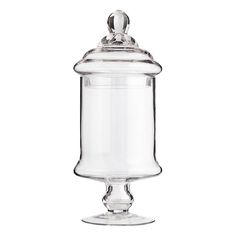 a clear glass jar with a metal lid on the top and bottom, sitting on a white background