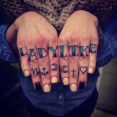 two hands with tattoos that say ladylike magic and i love you, lady like