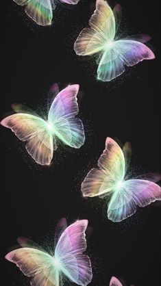 three pink butterflies flying in the air