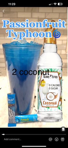 a bottle of coconut water next to a glass filled with liquid