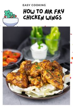 an image of chicken wings on a plate with vegetables in the background and text overlay that reads easy cooking how to air fry chicken wings