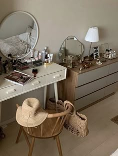 there is a vanity and mirror in the room