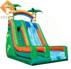 an inflatable water slide with palm trees on it