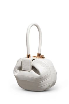 Designer White Clutch With Top Handle, Designer White Top Handle Clutch, White Designer Top Handle Clutch, Elegant White Bag With Round Handle, Modern White Clutch With Top Handle, Elegant Handheld Shoulder Bag With Rolled Handles, Elegant Handheld Bags With Rolled Handles, Elegant Double Handle Fashion Satchel, Modern White Top Handle Clutch