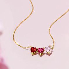 Ross-Simons - .60ct t. w. Multi-Gemstone Heart Necklace in 14kt Yellow Gold. 18". RS Pure. Modern designs that complete your outfit and complement your personality. Sweet sparkle in a minimalist style! Indulge in our dainty necklace, featuring a trio of .60 ct. tot. gem wt. heart-shaped garnet, rhodolite garnet and amethyst. Crafted in polished 14kt yellow gold and stationed on a simple cable chain. Lobster clasp, multi-gemstone heart necklace. Garnet birthstones are the perfect gift for January Heart Shape Jewelry Design, Birthstone Necklaces, Pink Gold Necklace, Pokémon Heroes, Heart Shaped Jewelry, Heart Shaped Necklace, Heart Shaped Sunglasses, Purple Jewelry, Garnet Necklace